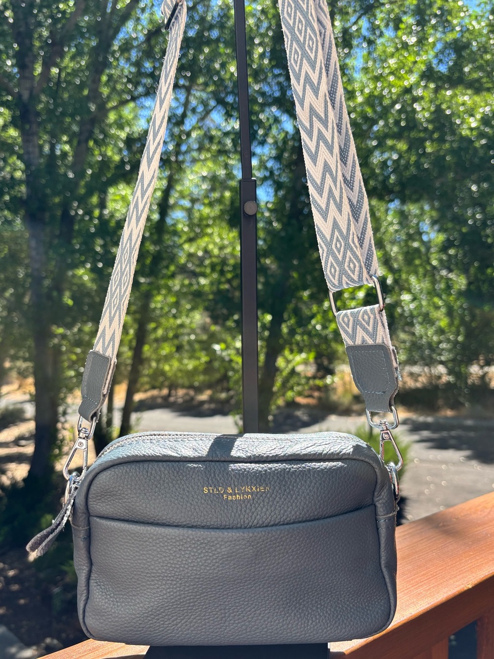Stella & Max blue pebble, leather Crossbody Bag with Patterned guitar Strap